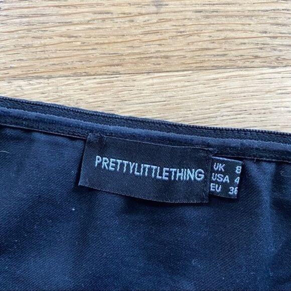 Pretty Little Thing Bandeau Zip Front Crop Top in Black - Picture 2 of 4